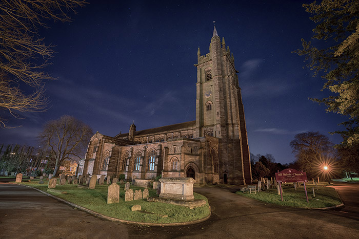All Saints Church on a moonlit night