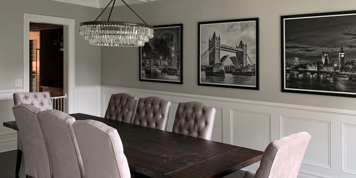 Art for the home Black and white framed prints of London landmarks in a dining room