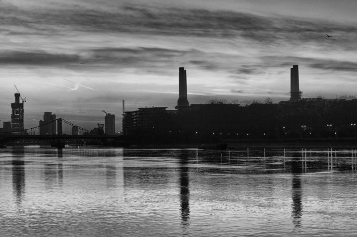 Battersea Power Station at Dawn on the River Thames in Wandsworth in black and white