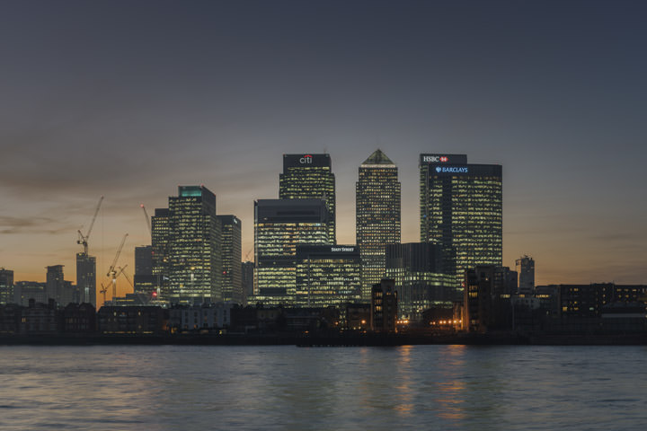 The lights come on at Canary Wharf  at dusk in this skyline scene