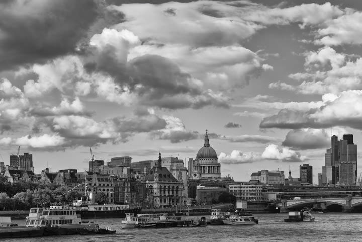 Clouds over City of London Skyline and St Pauls  in black and white