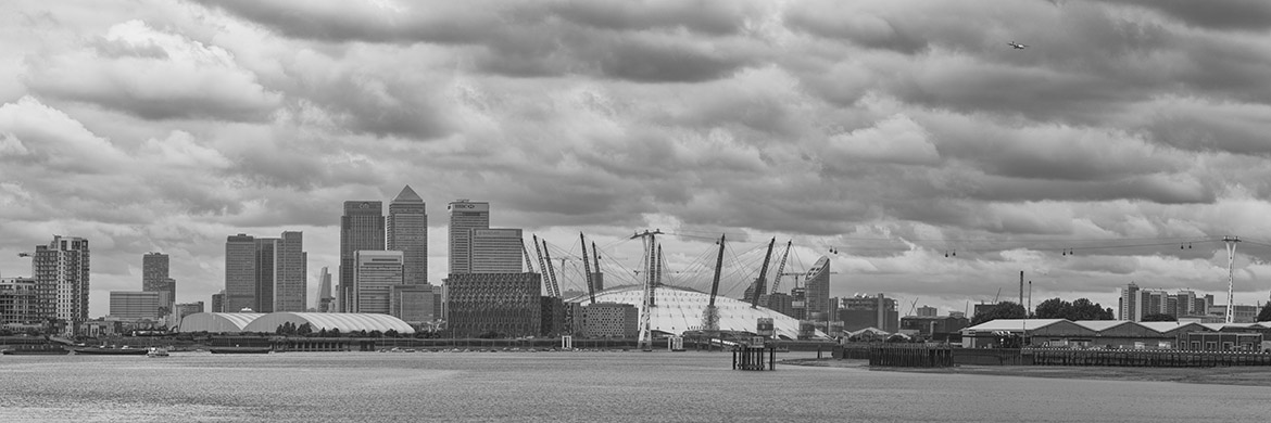 Moody Docklands Panorama shot on a cloudy day.