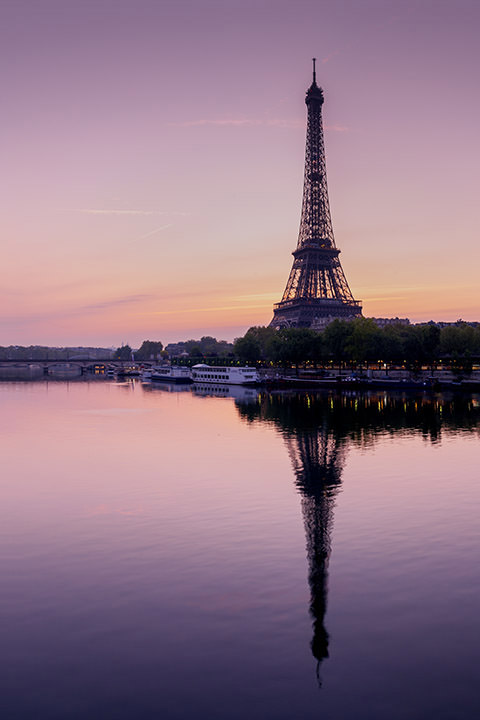 Eiffel Tower reflection pink sky