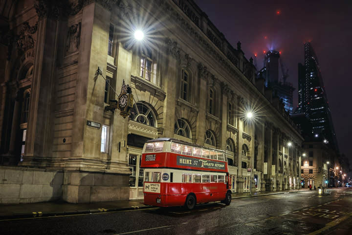 Vintage red London bus on Cornhill in London