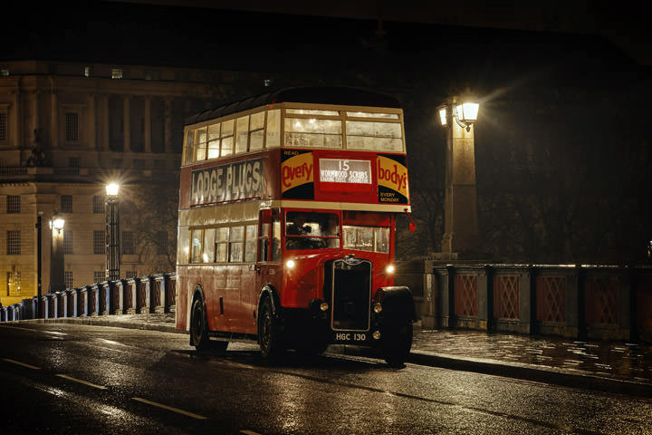 Vintage London Bus in the mist on Lambeth Bridge