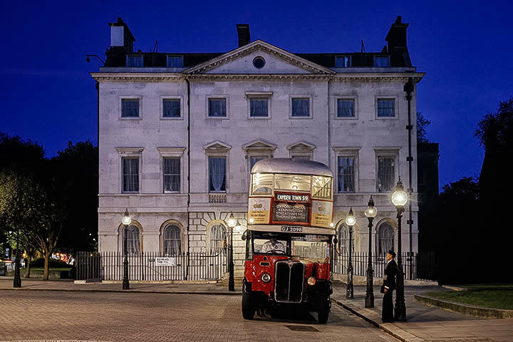 Vintage London Bus at dusk in Westminster
