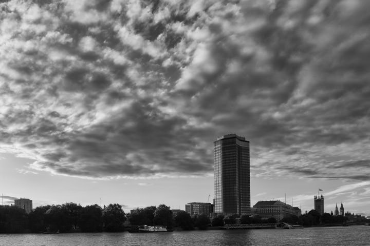 Millbank  Tower  in black and white under a dramatic sky