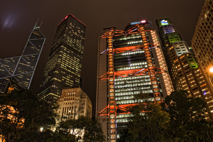 Hong King skyscrapers lit in orange during nightly light shoe