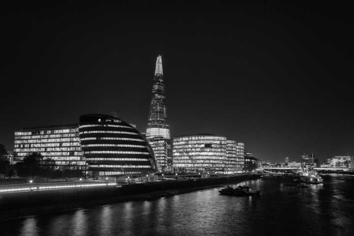 Shard and More London at night in black and white