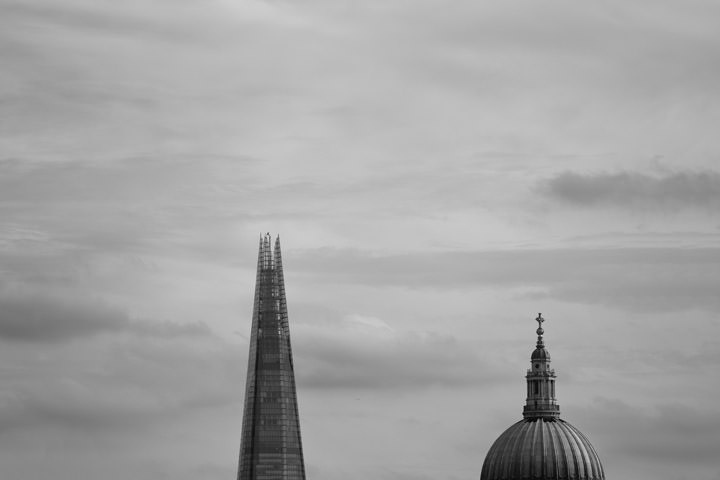 Tips of Shard and St Pauls Cathedral in London in black and white