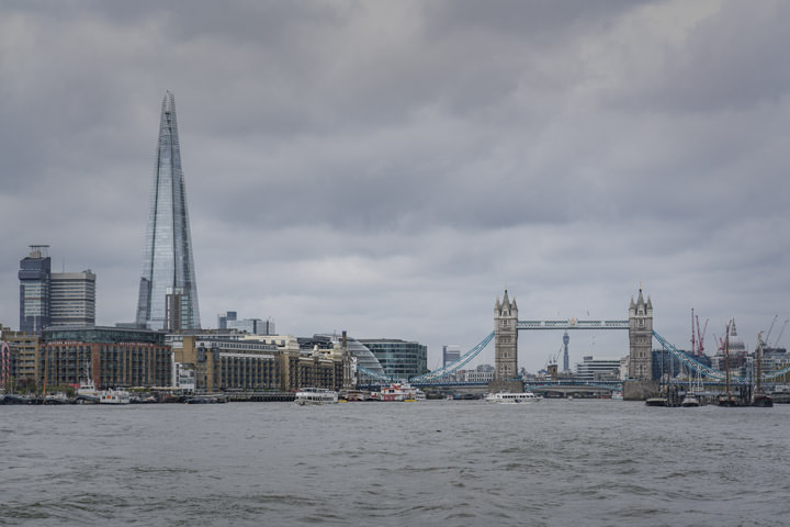 The Shard and Tower Bridge from the River Thames on a cloudy day