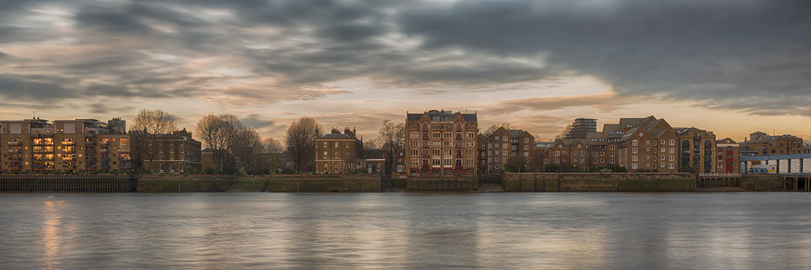 A panoramic picture of The River Thames waterfront at Wapping  in Tower Hamlets