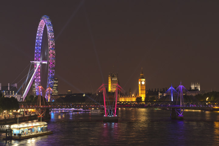 The London Eye, Houses of Parliament and Golden Jubilee Bridge brightly lit at night