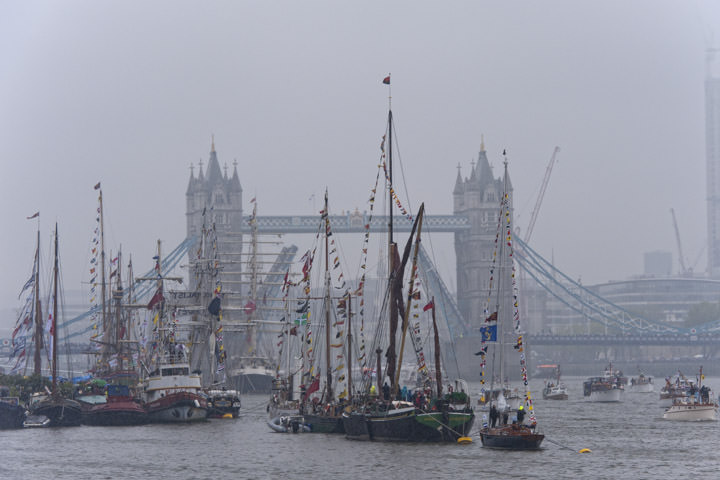 Tall ships and Tower Bridge viewed from River Thames at Bermondsey in Southwark