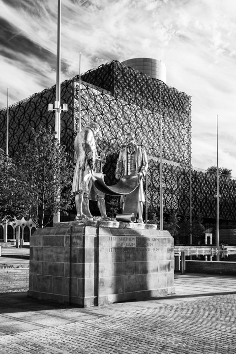 Black and white photo of Birmingham Library  statue of boulton watt and murdoch