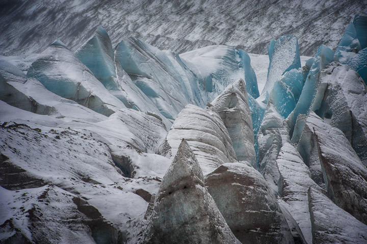 Icelandic glacier with blue ice patterns.