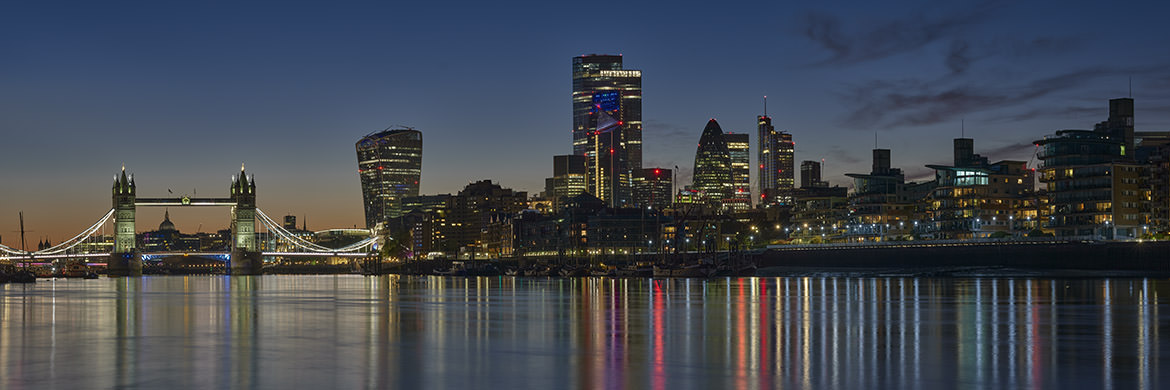 City of London Skyline At Dusk  as lights appear on the city slkyscrapers
