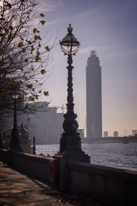 A street lamp in front of St Georges Tower on a fine day.
