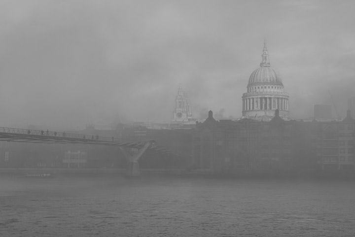 Misty St Pauls Cathedral and the Millennium Bridge in black and white