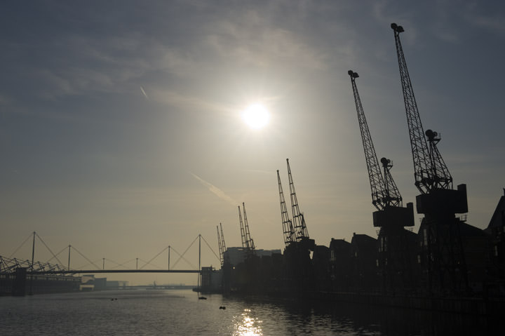 Cranes and Excel Centre at Victoria Dock, one of the Royal Docks in London